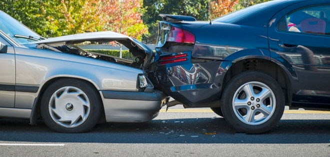 two cars crashing in a car accident in need of legal help